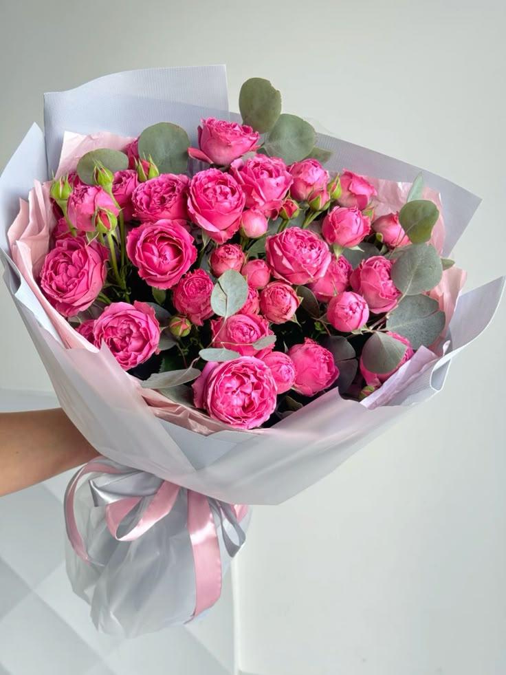 Corporate meeting room with carefully timed floral arrangements that maintain elegance throughout business hours